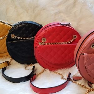 Pink round cross body purse